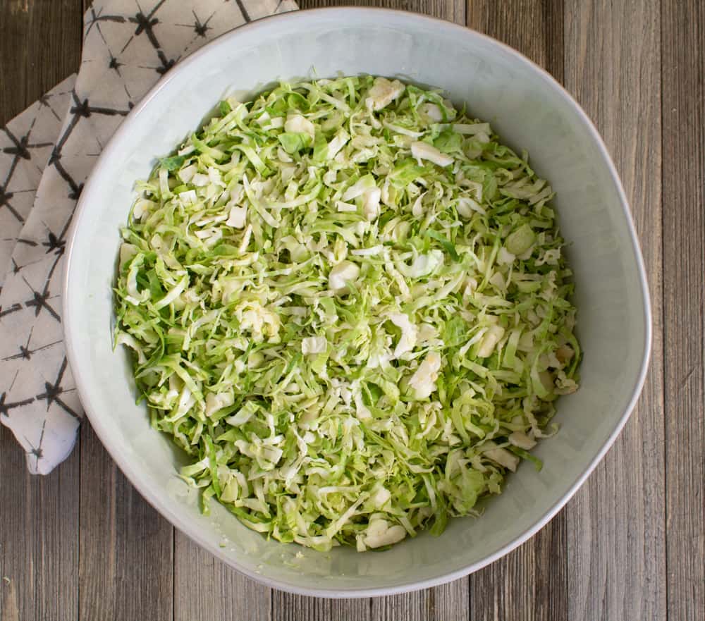 Bowl full of shaved Brussels sprouts