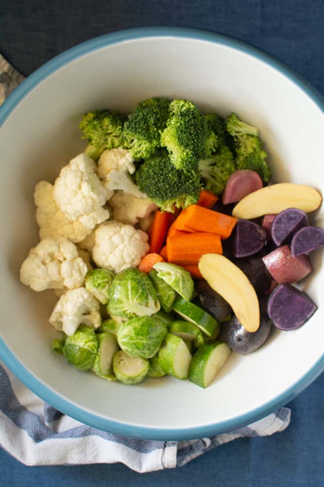 Raw veggies cut up in bowl