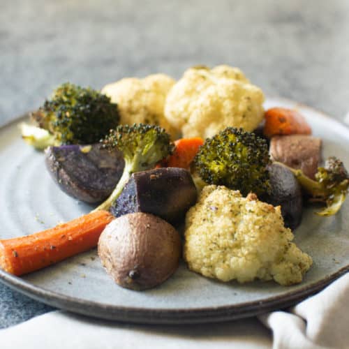 plate of ranch roasted veggies (cauliflower, carrots, purple potatoes, and brocolli)