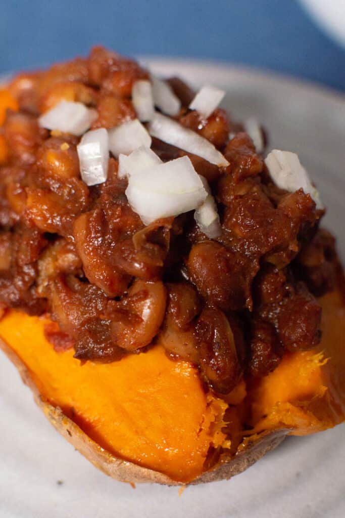 BBQ beans on top of baked sweet potato