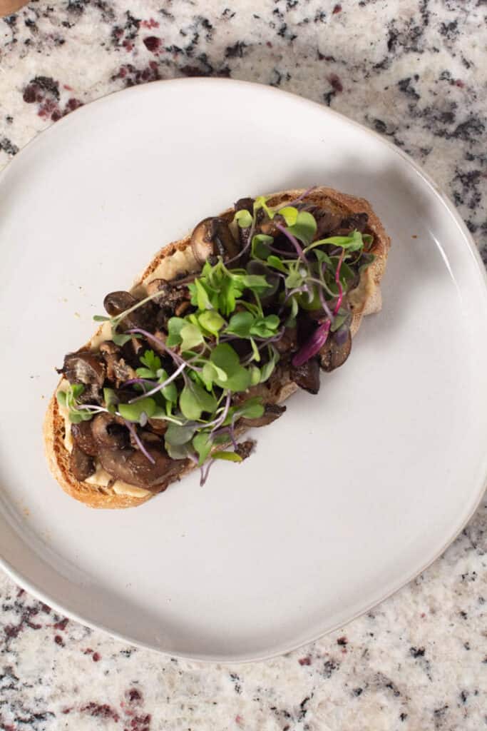 Mushroom toast with micro greens on top