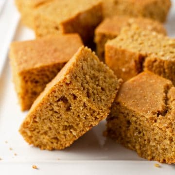 Tray full of sliced cornbread.