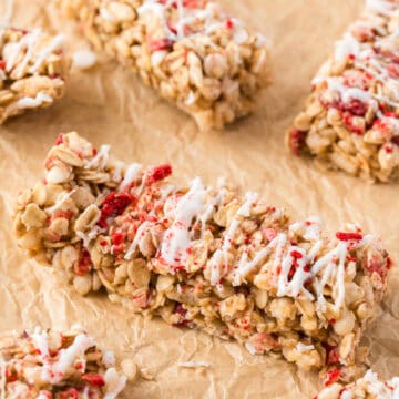 granola bars spread on brown parchment paper.