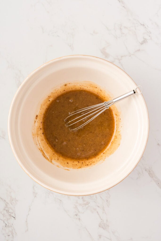 overhead shot of wet ingredients mixed together including ground flax.